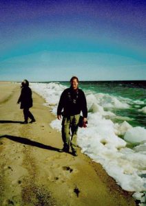 Chris Harvey-Clark walking the sandy shore of Skinny island